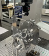  – Complex parts programmed and machined with <em>hyper</em>MILL<sup>&reg;</sup> undergo stringent quality controls at Alcon Precision
