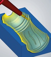  – L’usinage radial 5-axes est une stratégie très efficace pour la fabrication de moules de soufflage. 