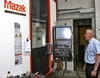md stephen collins | copsey engineering | aerospace – Managing Director Stephen Collins with one of many Mazak 5-axis machines at the facility.